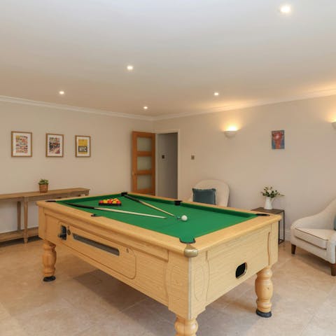 Get competitive with a round of pool in the games room