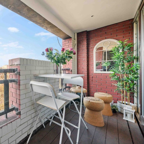 Dine alfresco on the private covered balcony