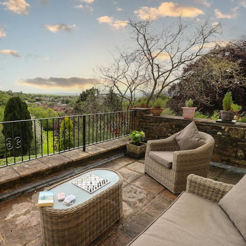 Admire the countryside view from the shared gardens
