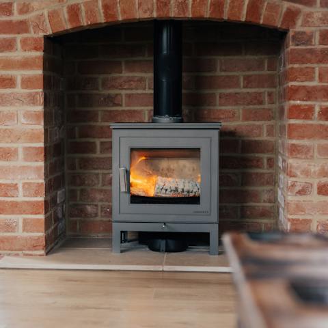 Throw another log on the wood-burning stove in the living room