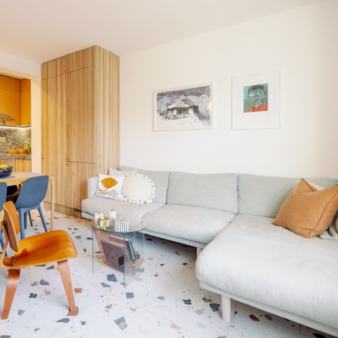 Unwind with a glass of natural wine on the sofa