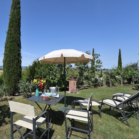 Enjoy countryside views over an alfresco meal on the lawn