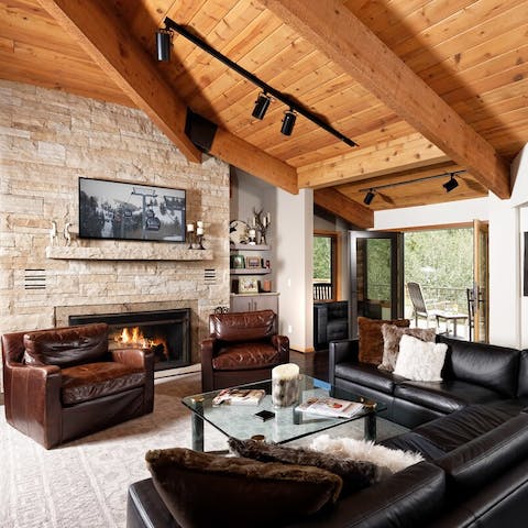 Warm up on the leather sofas by the fire