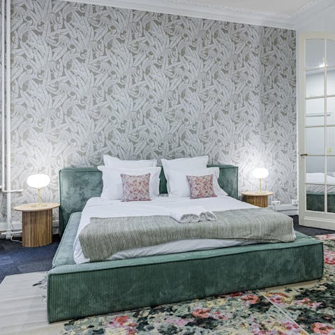 Drift off in the garden-inspired main bedroom, a calm retreat after a day in the city