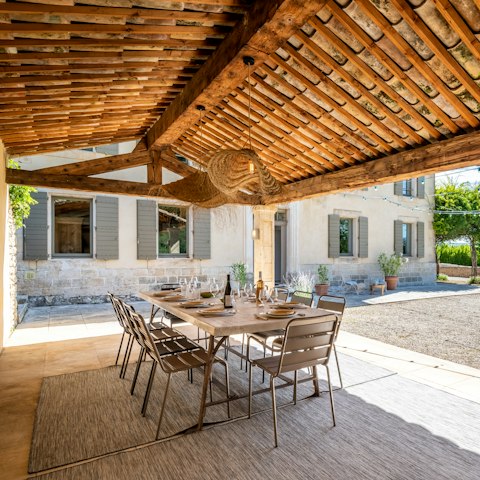 Enjoy alfresco meals beneath the pergola