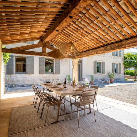 Enjoy alfresco meals beneath the pergola