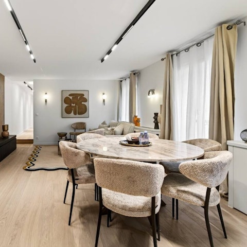 Enjoy a glass of Champagne at the dining table