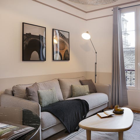 Relax on the comfy sofa after a busy day in Paris