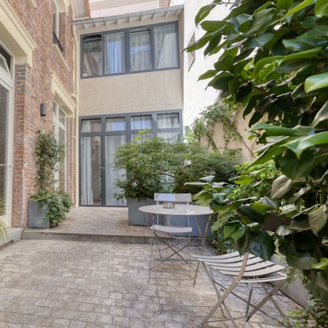Sip your morning coffee in the shared courtyard