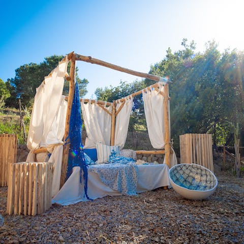 Relax on the day bed facing the Tyrrhenian Sea