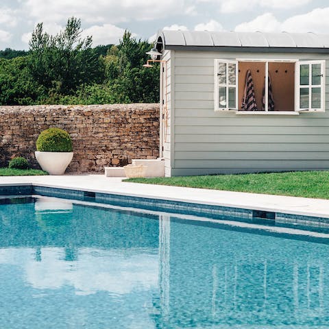 Enjoy floating around the outdoor swimming pool