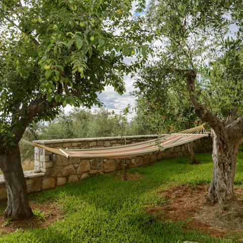 Take some time to yourself to read a book in the hammock