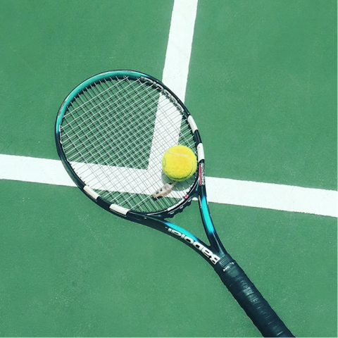 Watch a tennis match at the Roland Garros Stadium, around 500 metres away