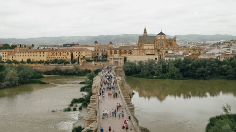 Cross Puente Romano, an ancient Roman bridge spanning the Guadalquivir