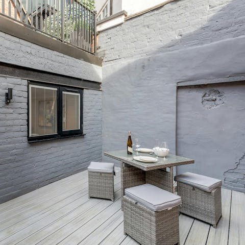 Enjoy a glass of wine on the small patio