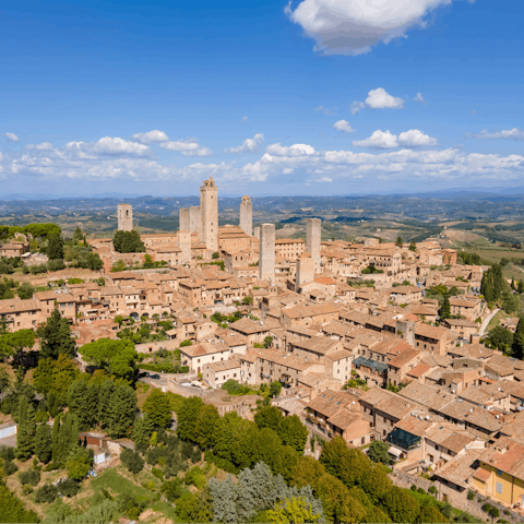 Discover the Medieval hill town of San Gimignano – a thirty-minute drive away