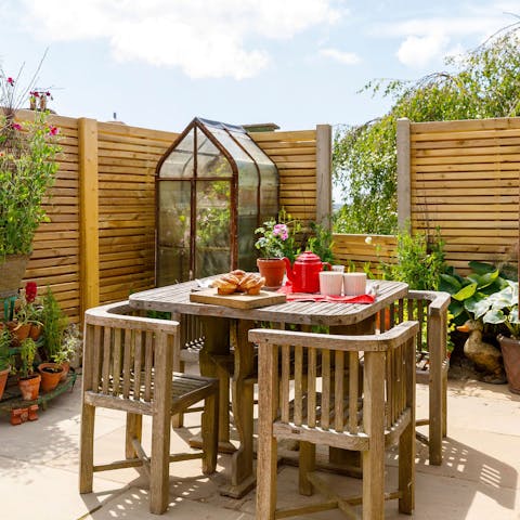 Enjoy tea and cakes in the private garden