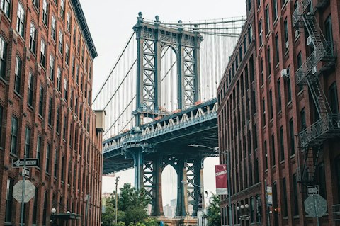 Explore DUMBO's cobblestones, galleries, and bridge views, fifteen minutes on foot