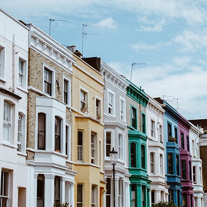 Stroll amongst the pretty pastel-coloured buildings of Notting Hill