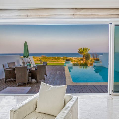Enjoy a glass of wine as you watch the sun on the patio