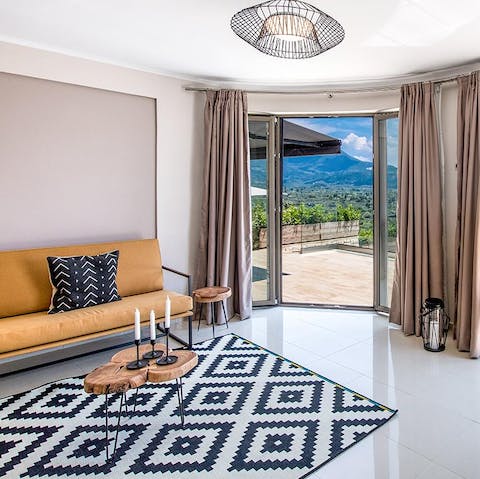 Relax in the bright and breezy living space with a glass of your favourite tipple