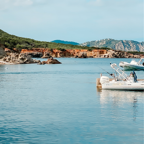 Stay a short stroll from the turquoise waters of Port d’es Torrent