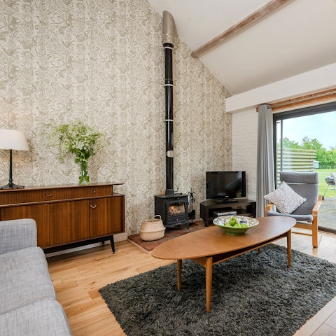 Get toasty beside the wood burner fire