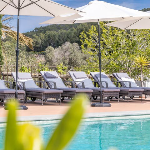 Lie back and soak up that vitamin D by the private pool