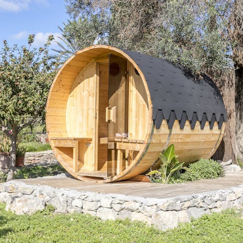 Unwind and relax in the garden's sauna