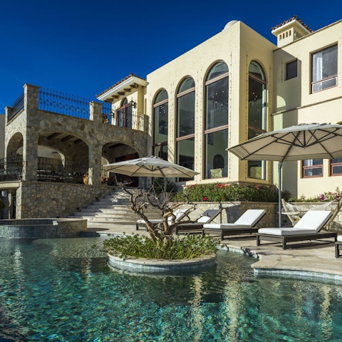Spend your days lounging by the pool