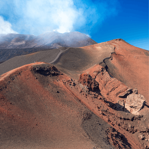 Explore the lunar landscapes of Parco dell'Etna, a fifteen-minute drive away