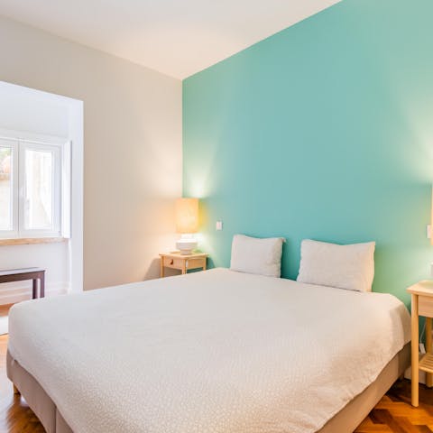 Unwind in the minimalist bedrooms after a busy day of sightseeing