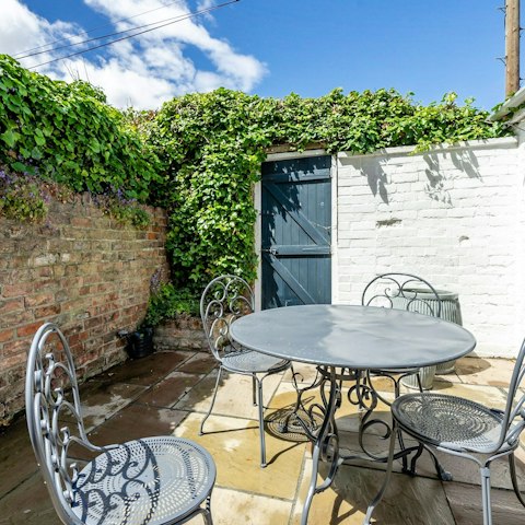 Enjoy meals outside in the private courtyard