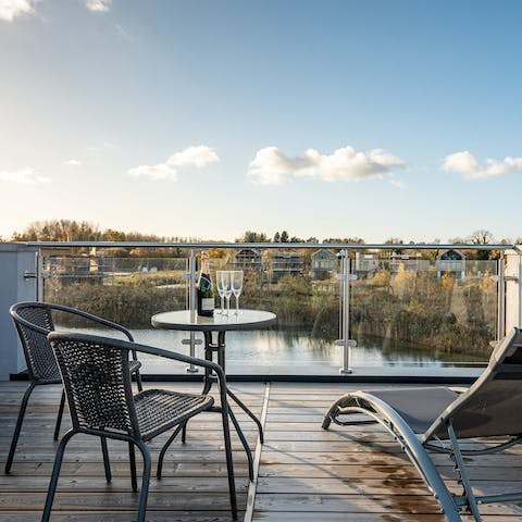 Sip a sundowner on the roof terrace overlooking the water