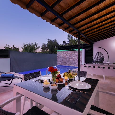 Enjoy a romantic dinner for two alfresco as the sun begins to set