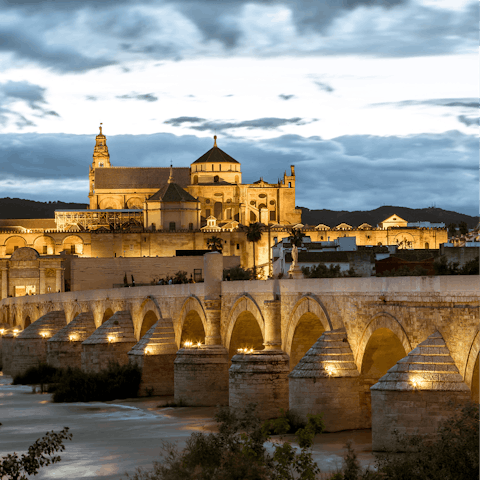 Admire the ancient Moorish architecture of Cordoba's centre, a short drive away