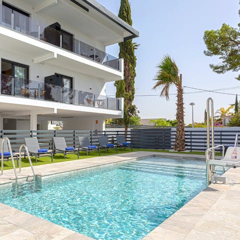 Pad down to the shared swimming pool and lounge the day away