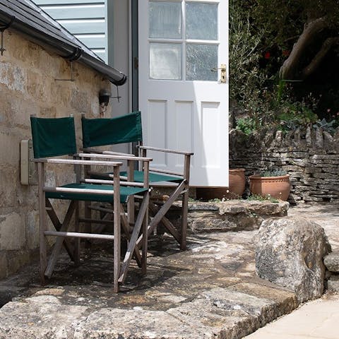 Sip sundowners and dine alfresco beneath the trees