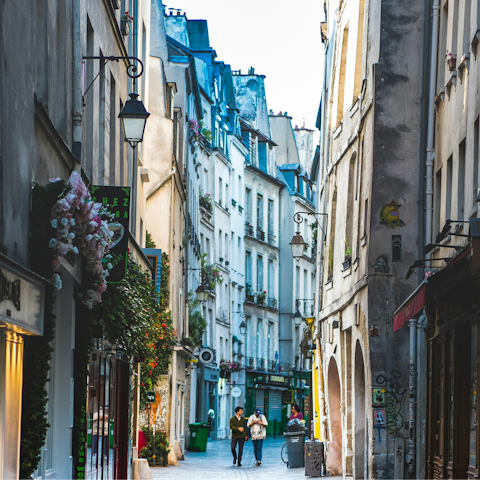 Enjoy exploring the charming cobbled streets of Le Marais