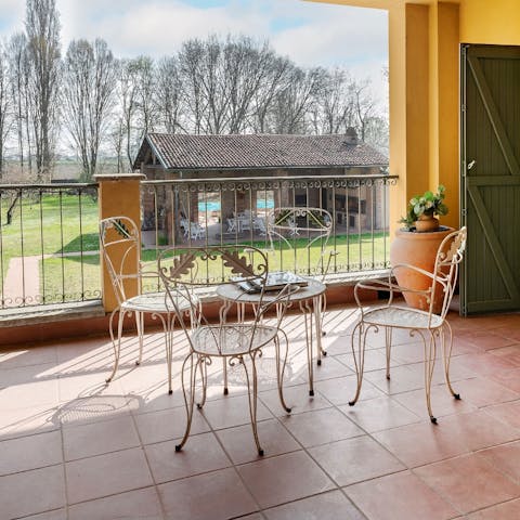 Sip a morning espresso overlooking the vast garden