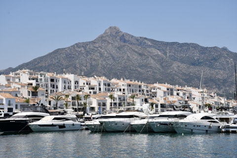Browse luxury yachts, designer boutiques, and vibrant nightlife at Puerto Banús