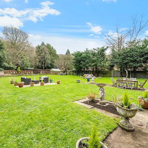 Find a quiet spot in the shared garden to enjoy a glass of wine