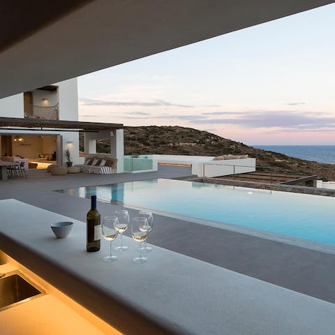 Pour a sundowner to enjoy outside on the patio