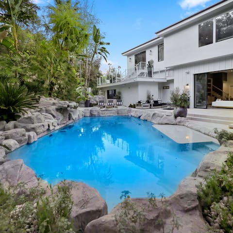 Float in a paradisal pool on hot afternoons, complete with waterfalls