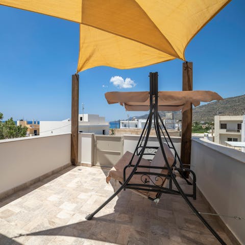 Head up to the rooftop terrace to take in the panoramic sea views