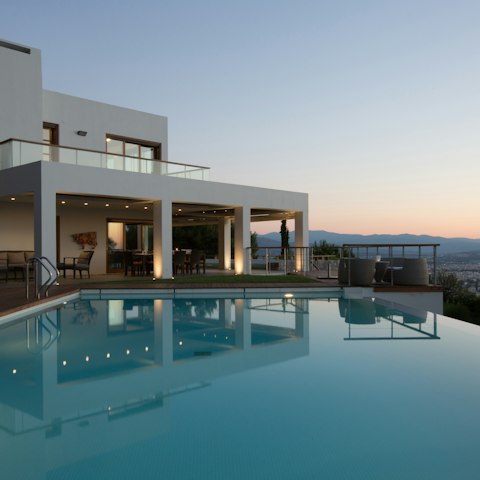 Take a sunset dip in the panoramic infinity pool