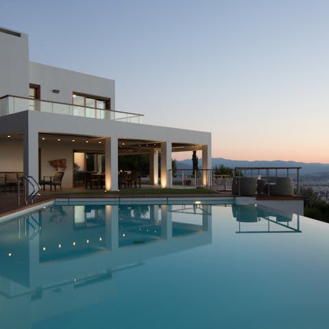 Take a sunset dip in the panoramic infinity pool