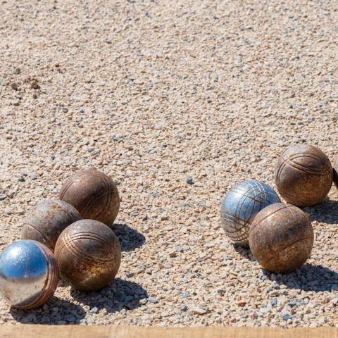 Unwind the French way – with a game of pétanque and a glass of wine
