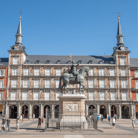 Stroll around the bustling Plaza Mayor before stopping for a coffee