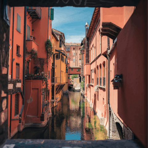 Explore the charms of Bologna, a thirty-minute drive away